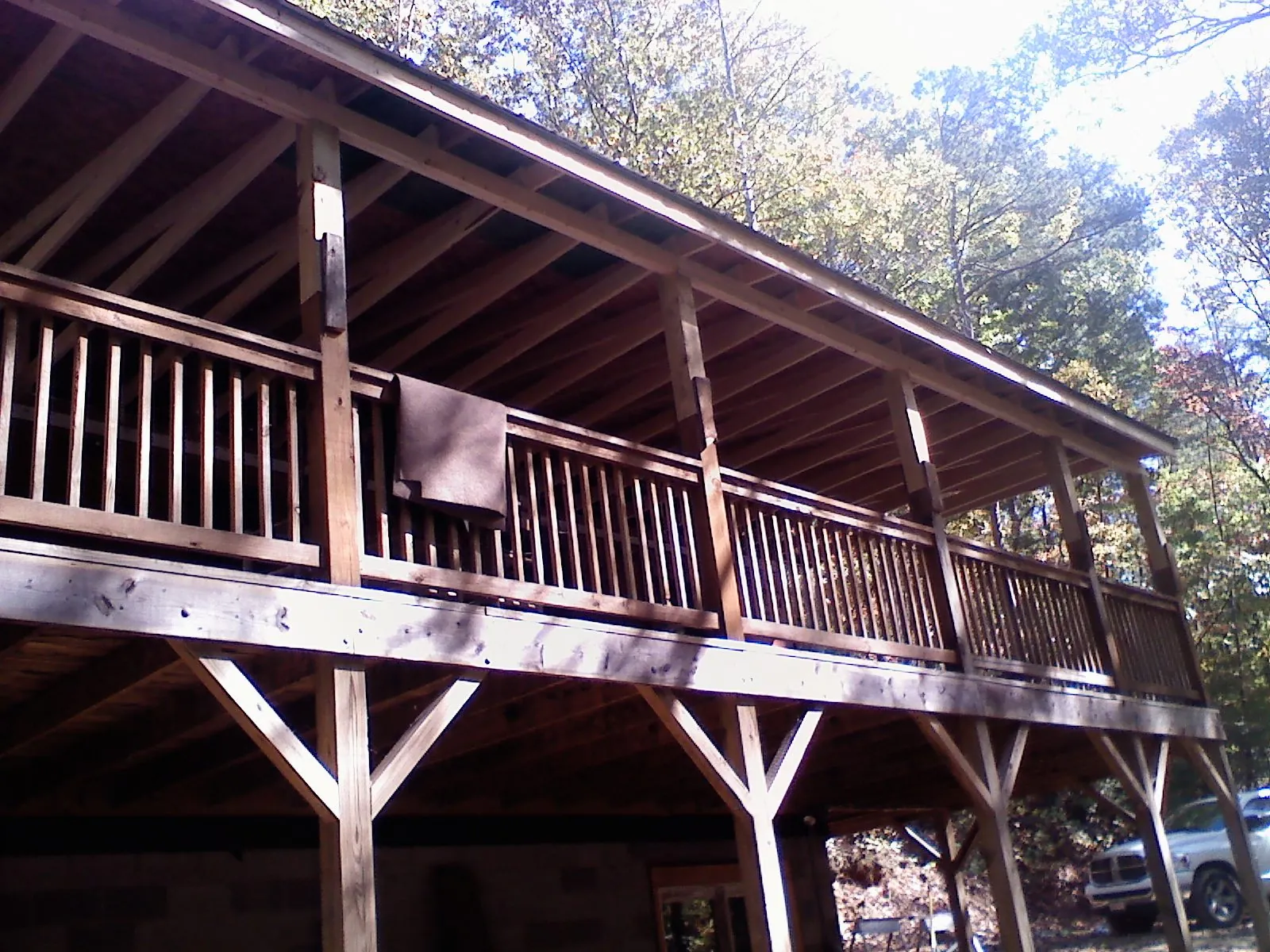 Timber framing under a new elevated porch and deck — Roof Leak Repair in Woodrow by Roofing Brothers
